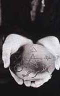 Vanessa holding a pentacle