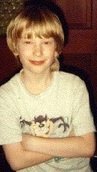 CHRIS LEANING ON THE EDGE OF THE PIC