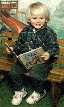 JOEY SITTING ON A BENCH