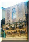 a decorated window from a palacial house for sale