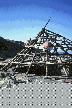 Volunteers working on a roof