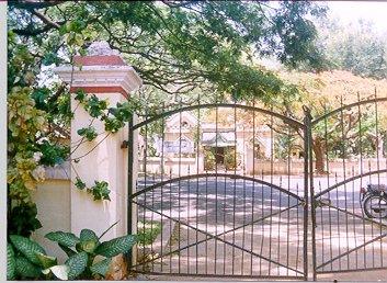 Through the gate to an identical house across the road