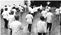 Square One Older Adult Centre Walk-a-thon Walkers warming up in Auditorium
