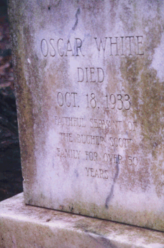 tombstone reads: Faithful Servant of the Bucher Scott Family for Over 50 Years