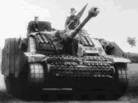 late StuG III in full dress of tracks and Schrzen