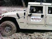 Hummer coming out of mud