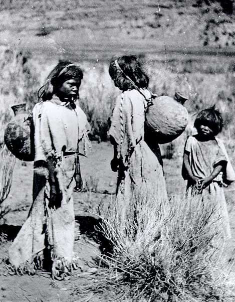 Children with water jugs