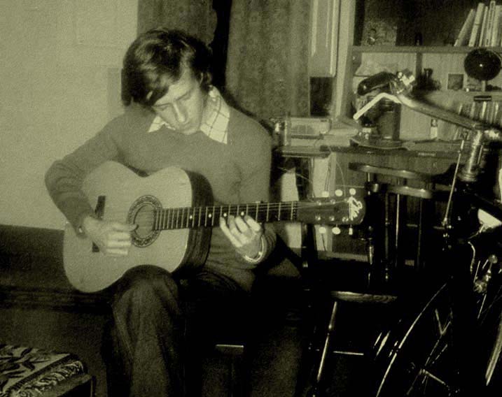 playing folk guitar