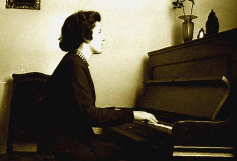 the mother playing piano