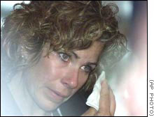 Canadian Olympian Marnie McBean weeps as Toronto's bid fails