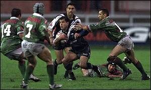 This is gonna hurt. Three Cedars pounce on a Kiwi player.