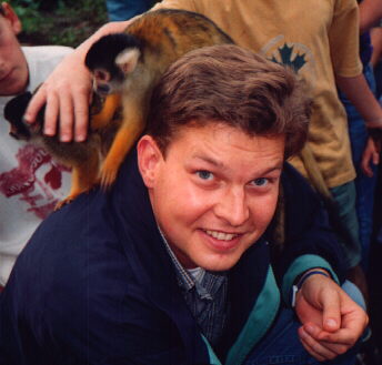 Wim with monkeys on his back.