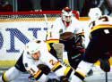 Lumme with big effort, in front of net with McLean