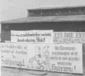 Sign painted by prisoners after liberation - in German & Polish