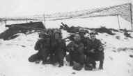 Group in position in beside gun position.