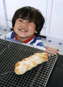 Thomas with bread