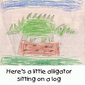 Here's a little alligator sitting on a log