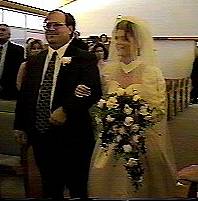 father escorts the bride