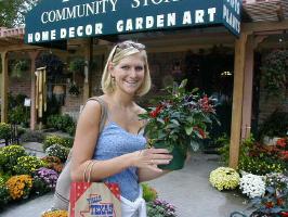 Kristin with her ornamental pepper plant... Texas Oct '99