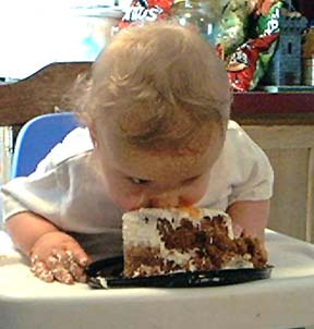 he could not bear to touch food or silverware. Mama smooshed his hand into the cake once, he would not touch it with his hands again!