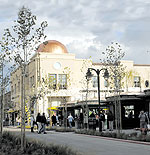 The copper-topped, Portuguese limestone-cladded Chaffey Building forms the east flank of Victoria Garden's central plaza 