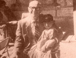 Brother Roloff with one of the children