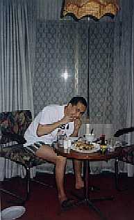 Roy eating inside the hotel room.  He refuses to leave the room!