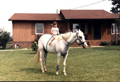 Me, at age 2, on Princess, age 3