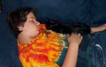 Nathan with black kitten