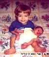 Jeffrey holding his new brother Ryan