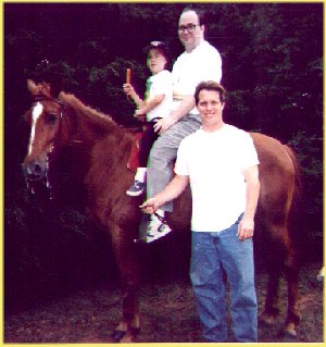 David, Paul, and Aaron horsing around with Renegade.