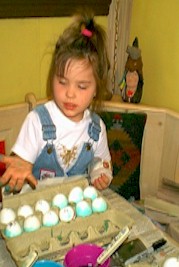 Haley Concentrating on Easter Eggs 15 April 2000