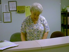 ME AT NURSES STATION, RUMFORD COMMUNITY HOME