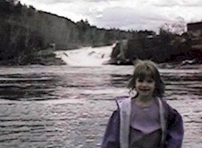 Becca in Front of Rumford Falls on April 7th, 1999
