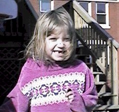 Becca in her yard on April 2nd, 1999