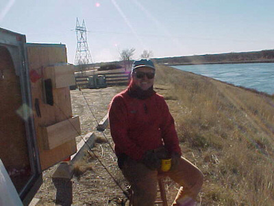 a fisherman enjoys the Oahe Dam