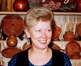 Judy Mallow in her booth at the North Carolina State Fair, 2000, The Village of Yesteryear Booth, photo by B. Stiles, used by permission