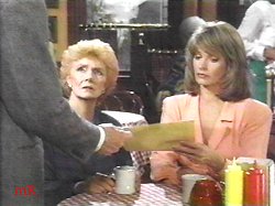 Marlena gets the divorce papers from Roman