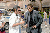 Director Tsui Hark gives directions to Van Damme