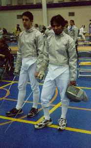 Two saberists pose for the camera