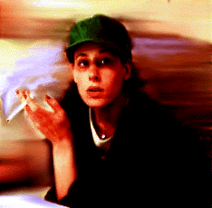Stephanie, smoking a cigarette...
