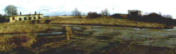 generator building and warheading building behind protective berms