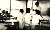  Photo taken in class after the LCE exam 1972. Mr. Raymond Tang (principal of the school) standing in front of the class.