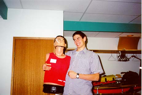 'The more he smokes, the more I can pound on his chest!' Nick gets silly with the CPR dummy.