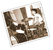 Alain playing the drum
