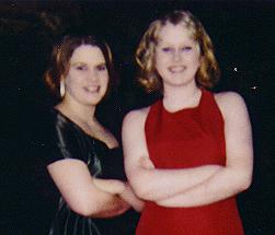 Michelle and Andrea showing off their prom dresses