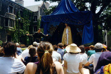 blue robes, gold mask, white christ