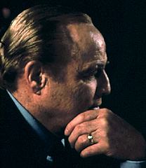 Marlon Brando in another thoughtful pose, side profile, from the 1970's, possibly