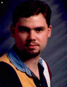 That's actually a small animal on his chin....