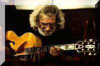 Photo of Jerry with guitar